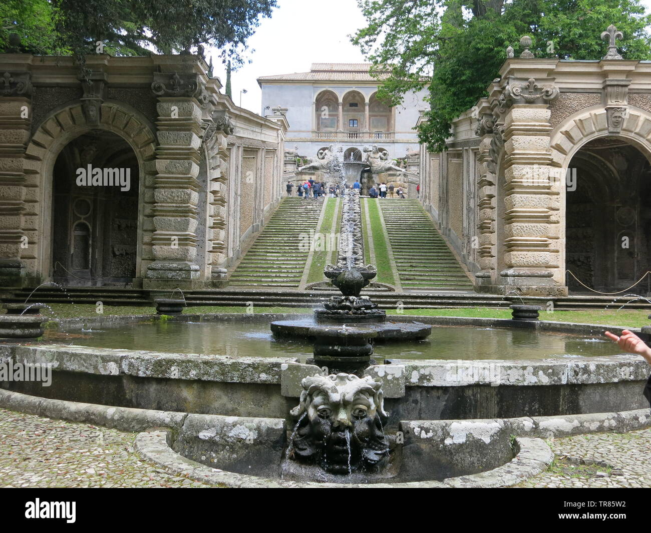 The gardens of the Villa Farnese feature ornate stonework and statues, and water features including fountains and a steeply inclined rill. Stock Photo