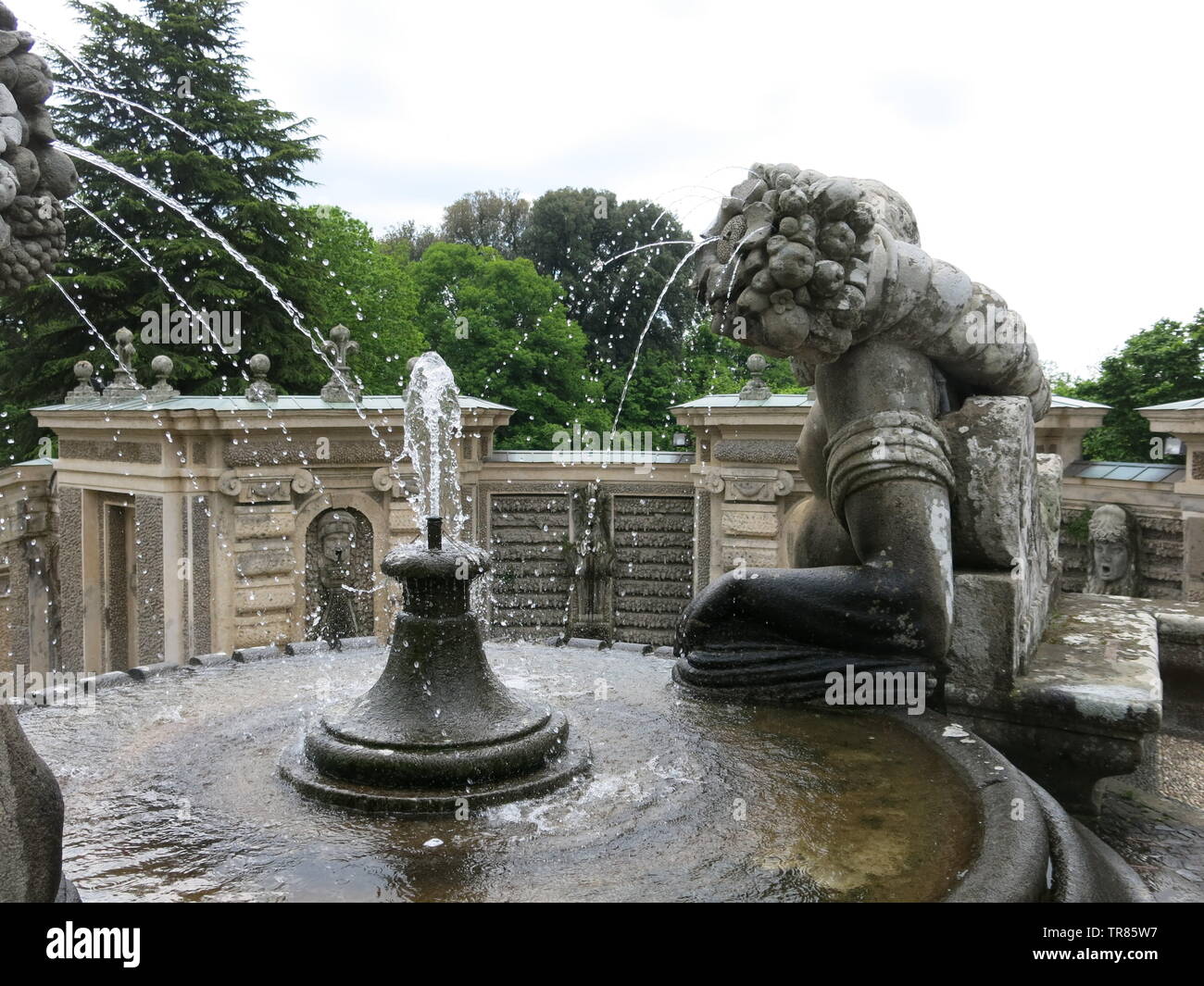 The gardens of the Villa Farnese feature ornate stonework and statues, and water features including fountains and a steeply inclined rill. Stock Photo