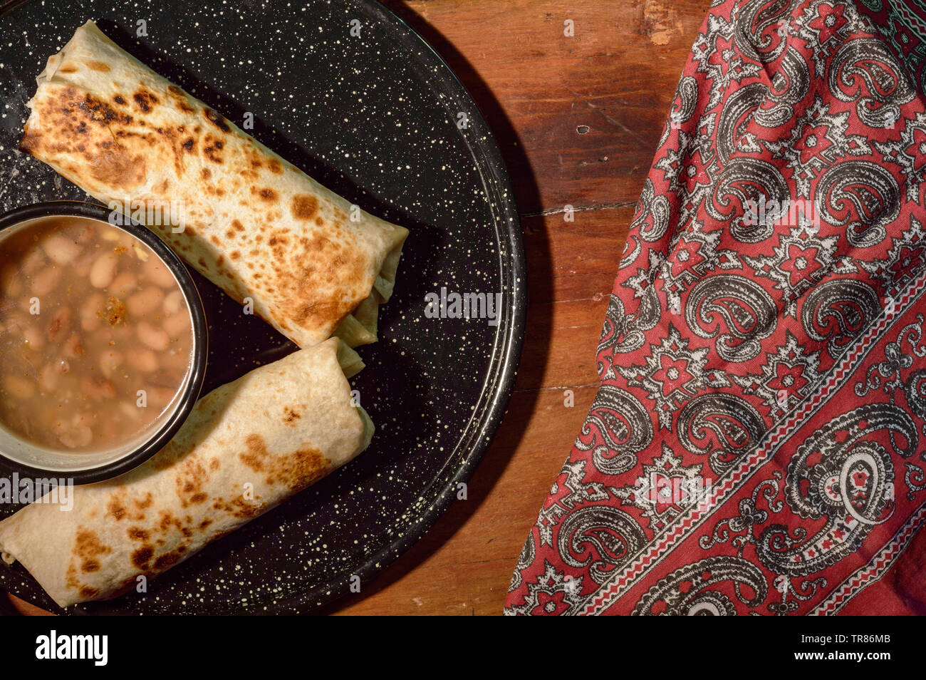 Mexican norteño breakfast, burritos of Sonoran machaca with eggs and beans. Concept for Mexican food, restaurants, food blogs, fast food, comfort food Stock Photo