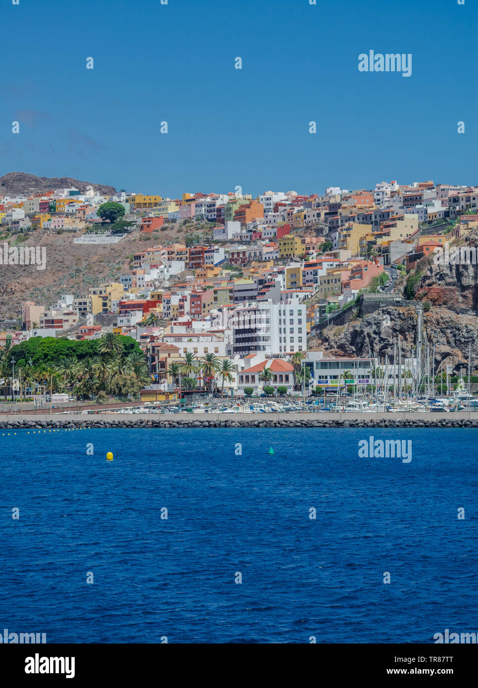 San Sebastian de la Gomera coastline, cityscape with sunlight, blue sky and Atlantic ocean, Canary islands, Spain Stock Photo
