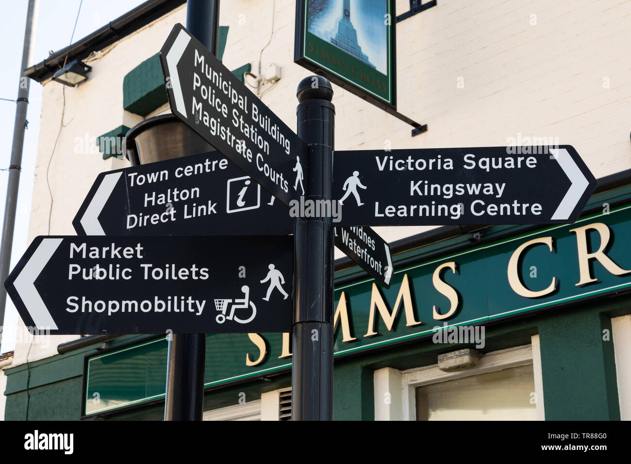 Signs in the town centre showing directions to many  local areas Widnes April 2019 Stock Photo