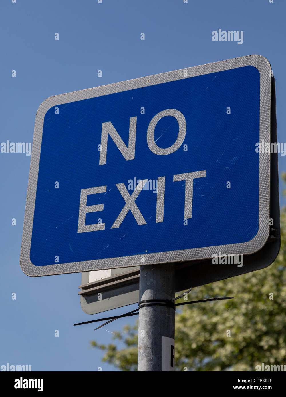 Blue and white rectangular no exit sign by the exit to a car park Widnes April 2019 Stock Photo