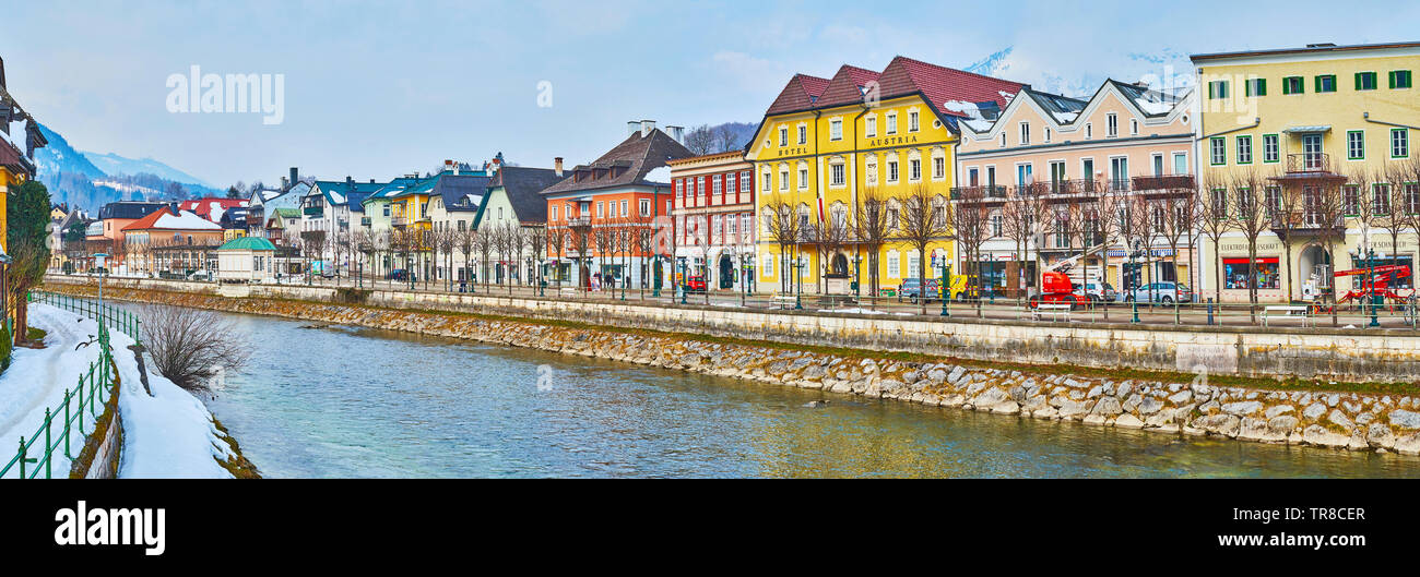 BAD ISCHL, AUSTRIA - FEBRUARY 20, 2019: Enjoy the cityscape of old town from the bank of Traun river, overlooking historic mansions, riverside park an Stock Photo