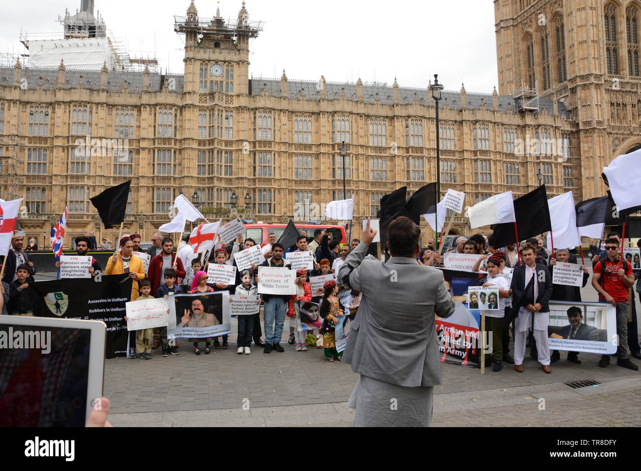 Pashtun Tahafuz Movement protest against the Pakistan Army outside the Houses of Parliament in London, 30th May 2019 Stock Photo