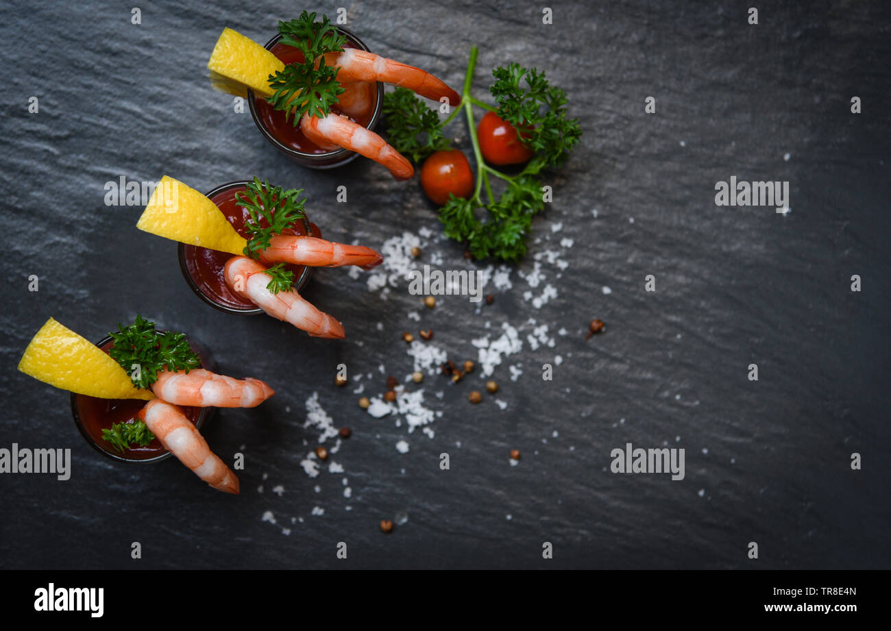 Glass shrimp cocktail in tomato sauce / Shellfish seafood boiled