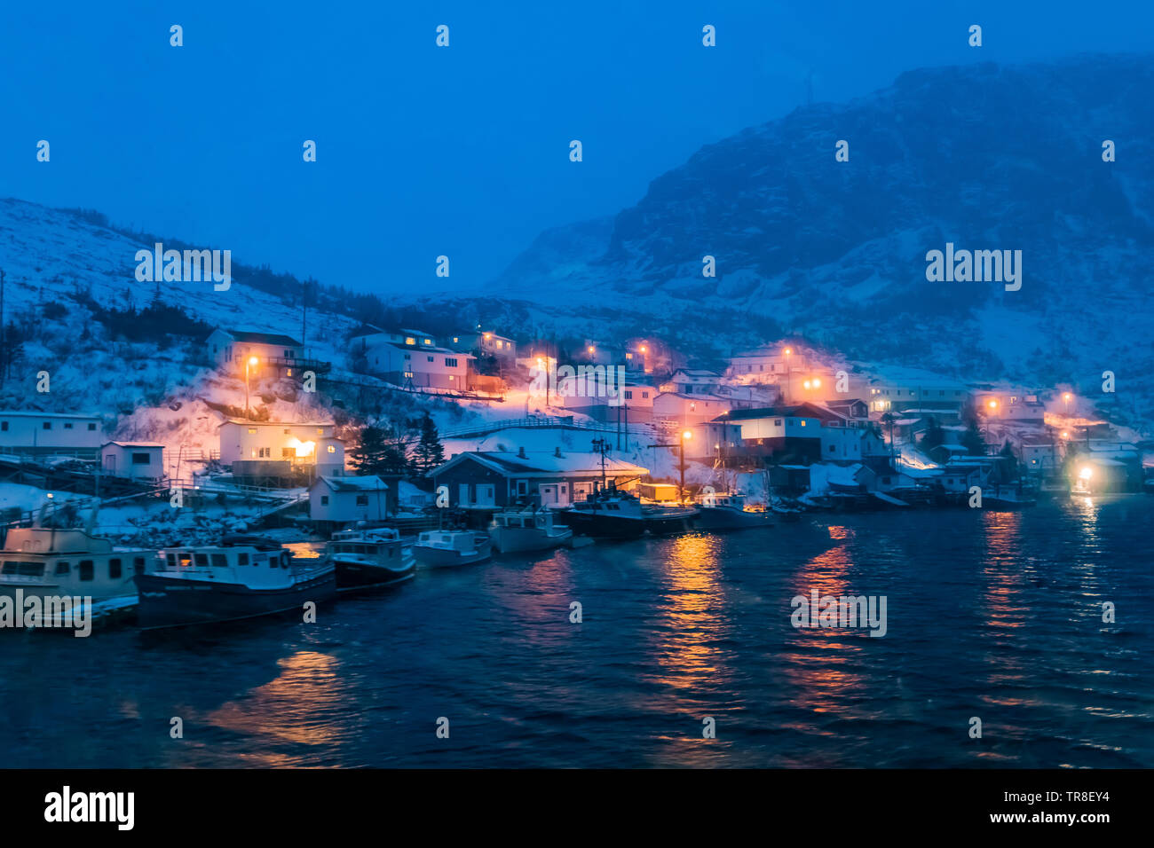 Snowstorm at night when the ferry Marine Voyager reached the outport village of Francois, Newfoundland, Canada Stock Photo