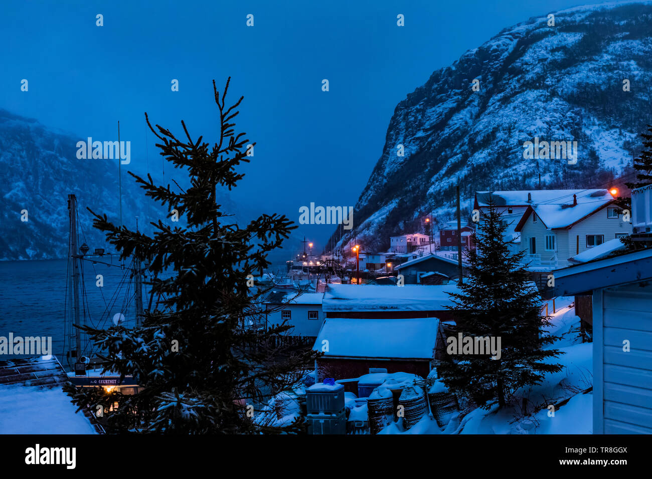 Waterfront in early morning in Francois, an outport (not reachable by road) in Newfoundland, Canada Stock Photo