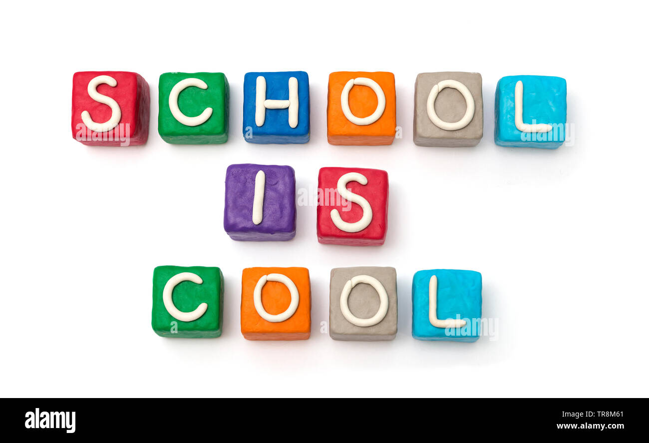 Coloreful blocks made of modeling clay with letters, put in words School is cool Stock Photo