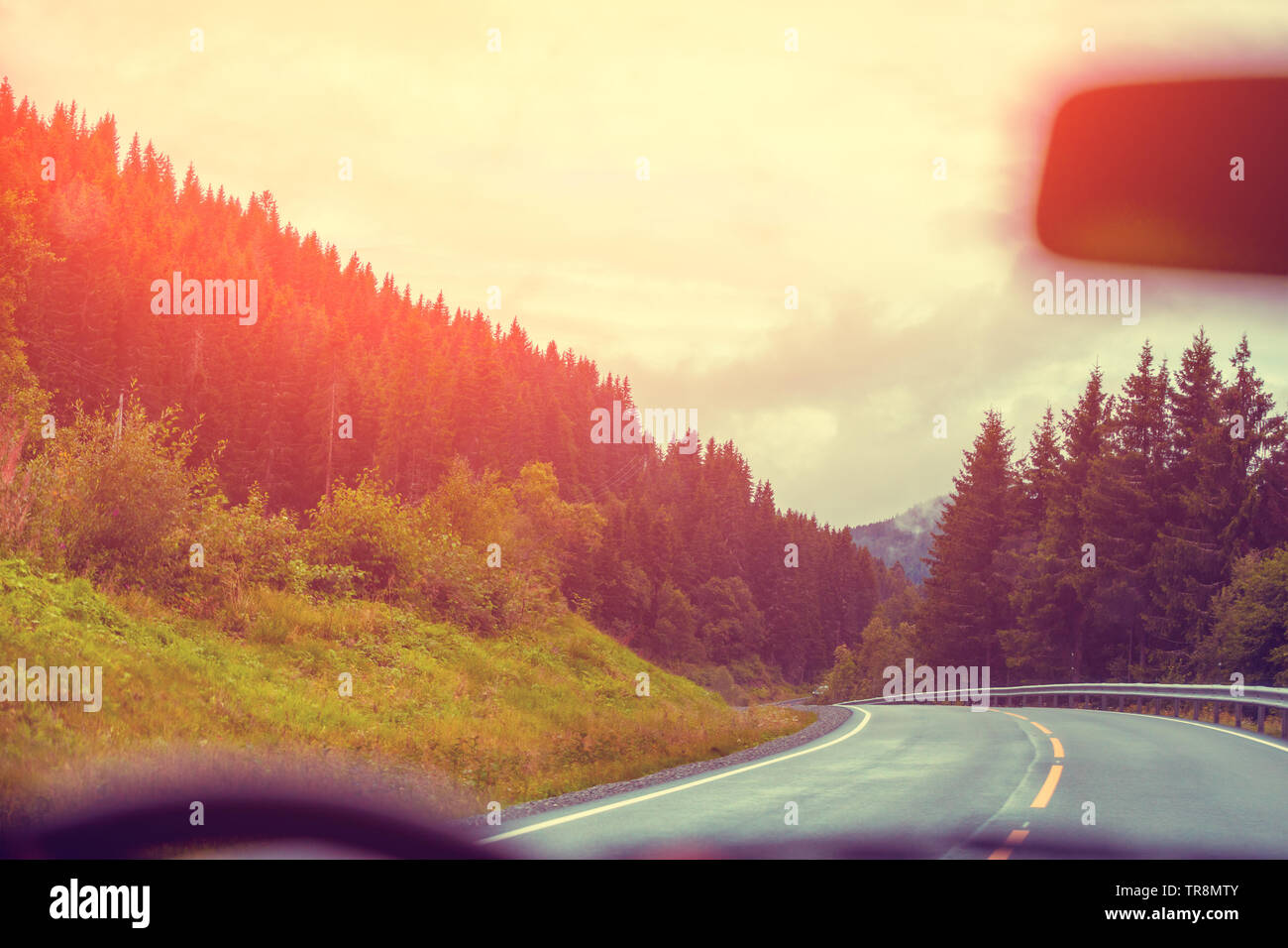 View from the windscreen. Driving a car on the mountain road. Beautiful ...