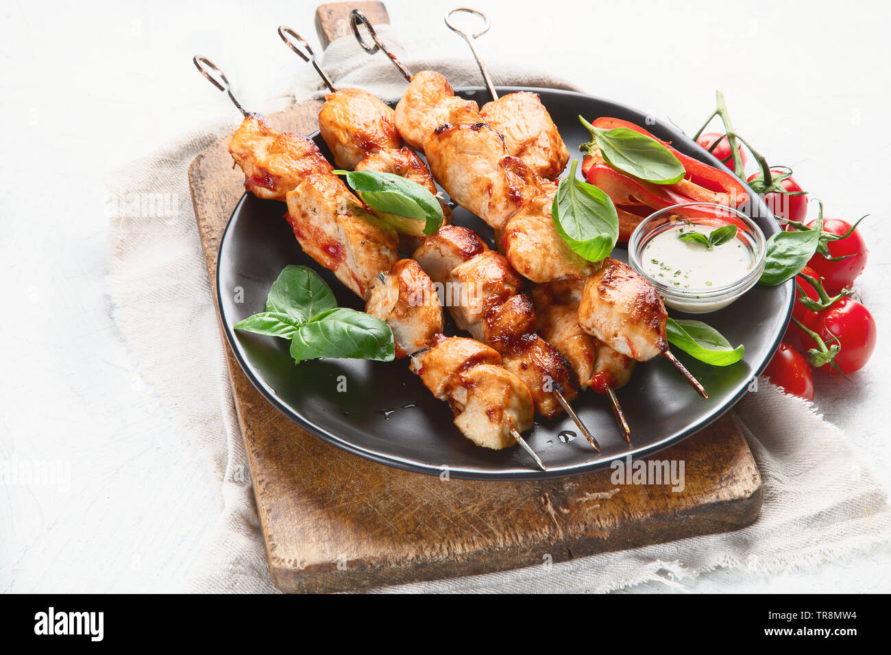 Homemade Grilled chicken on skewers. Stock Photo