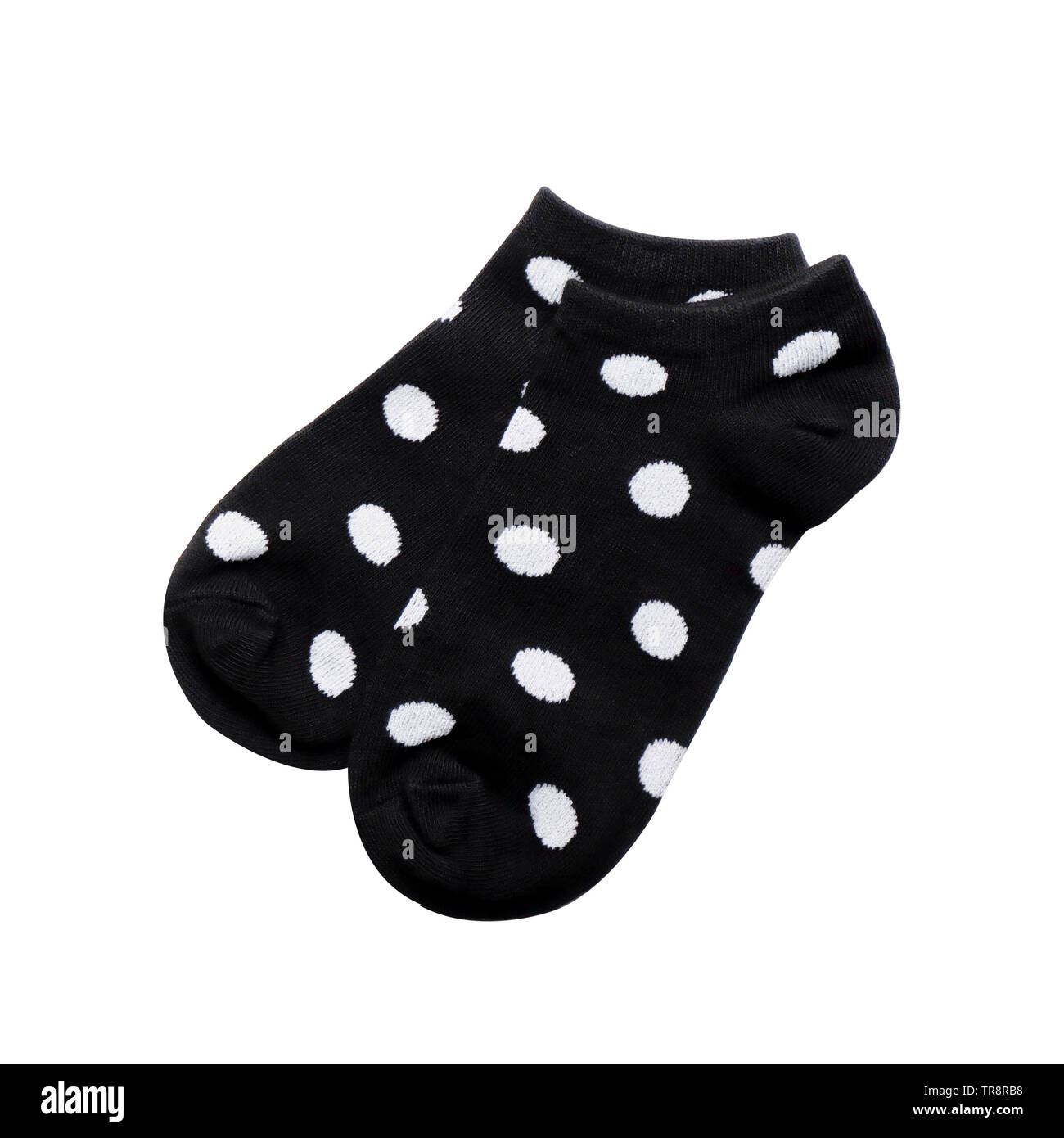 New Pair of Fashionable Kid Socks, Top View, Flat Lay. Beauty Black and White Polka Dot Sock Isolated on white Color Background with Clipping Path. Stock Photo