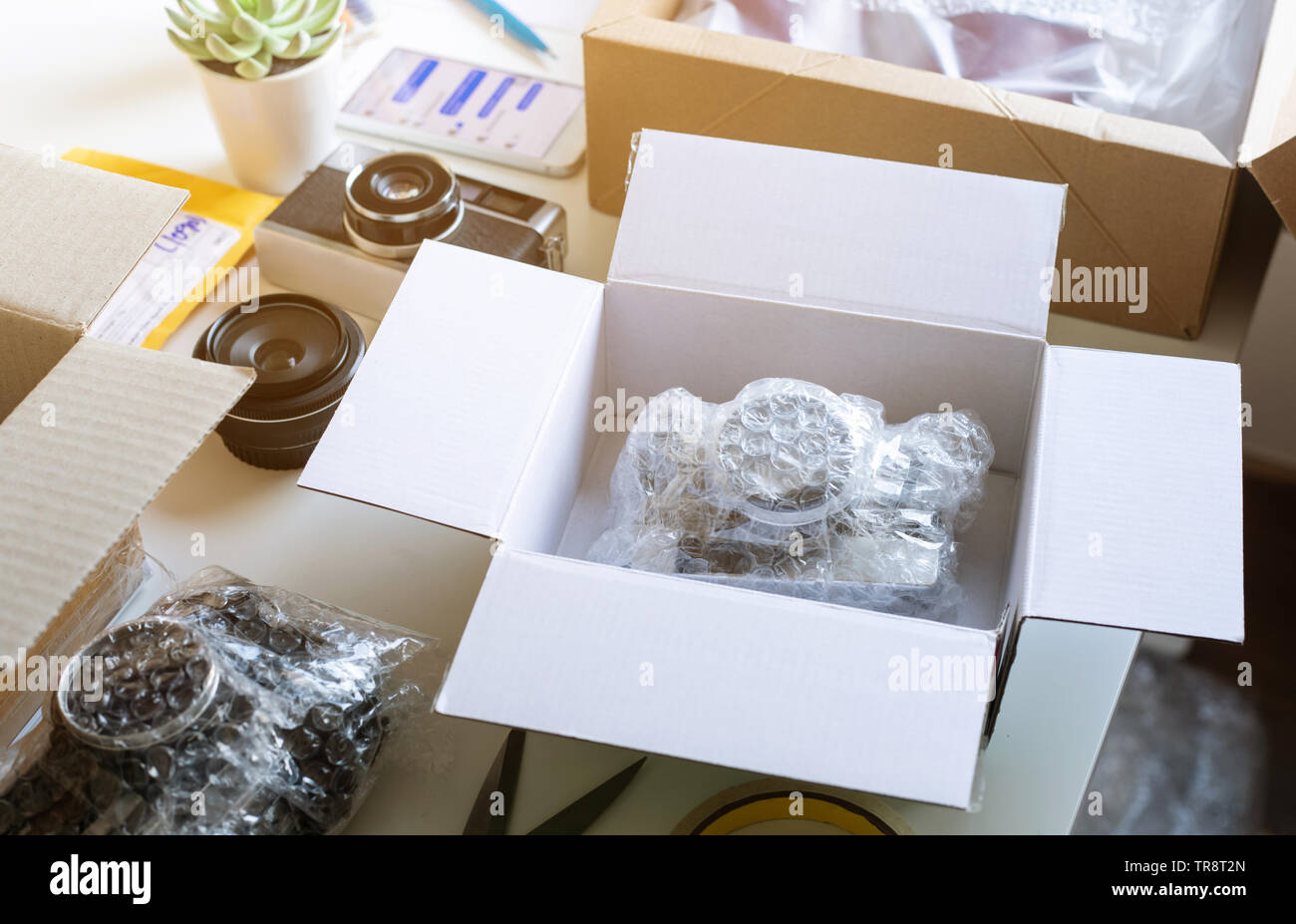 Online shopping concepts with product in box on desk table.Ecommerce,shipping delivery service.Business retail market Stock Photo
