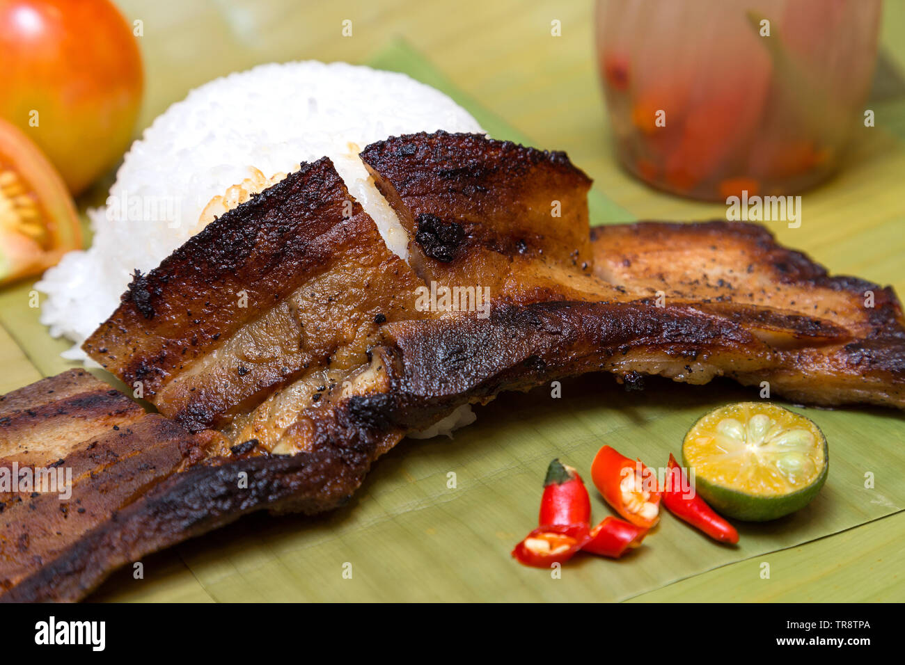 Philippine traditional dish: filipino liempo pork belly with rice Stock Photo