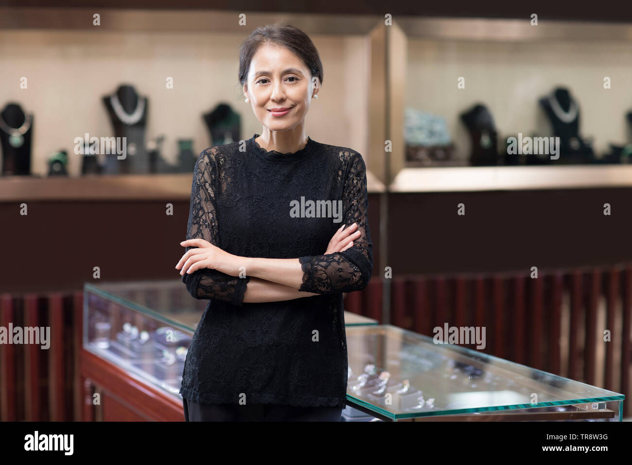 Chinese shopkeeper hi-res stock photography and images - Alamy