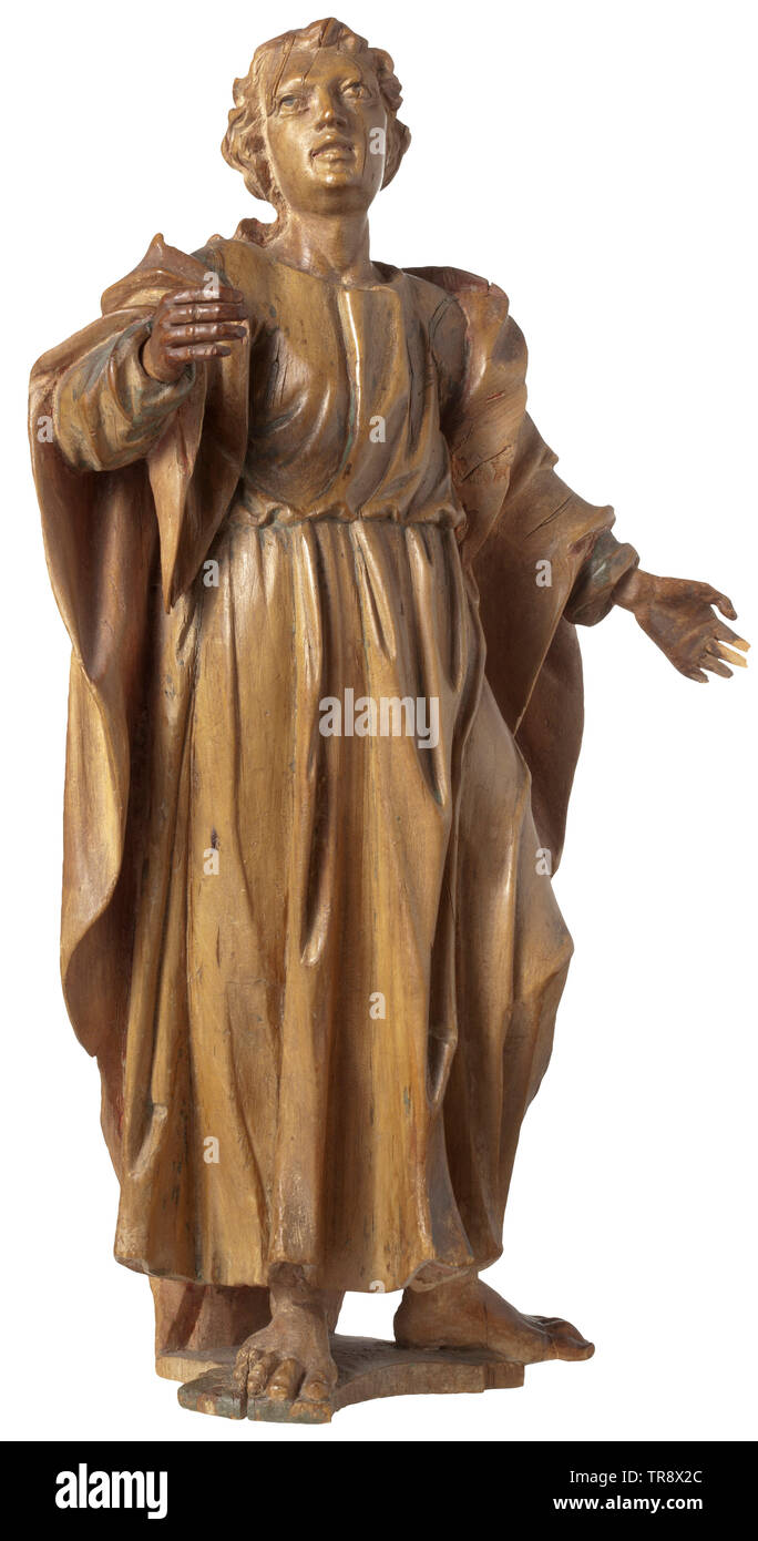 A South German sculpture of St. John, 18th century Three-dimensional figure made from lime wood with attached hands, probably originating from a crucifixion group. Standing figure, opulent arrangement of folds on garment and coat, on a flat plinth. Several restored shrinkage cracks, the hands are added, the fingers of the left hand are damaged. Height 39.5 cm. historic, historical, fine arts, art, Additional-Rights-Clearance-Info-Not-Available Stock Photo