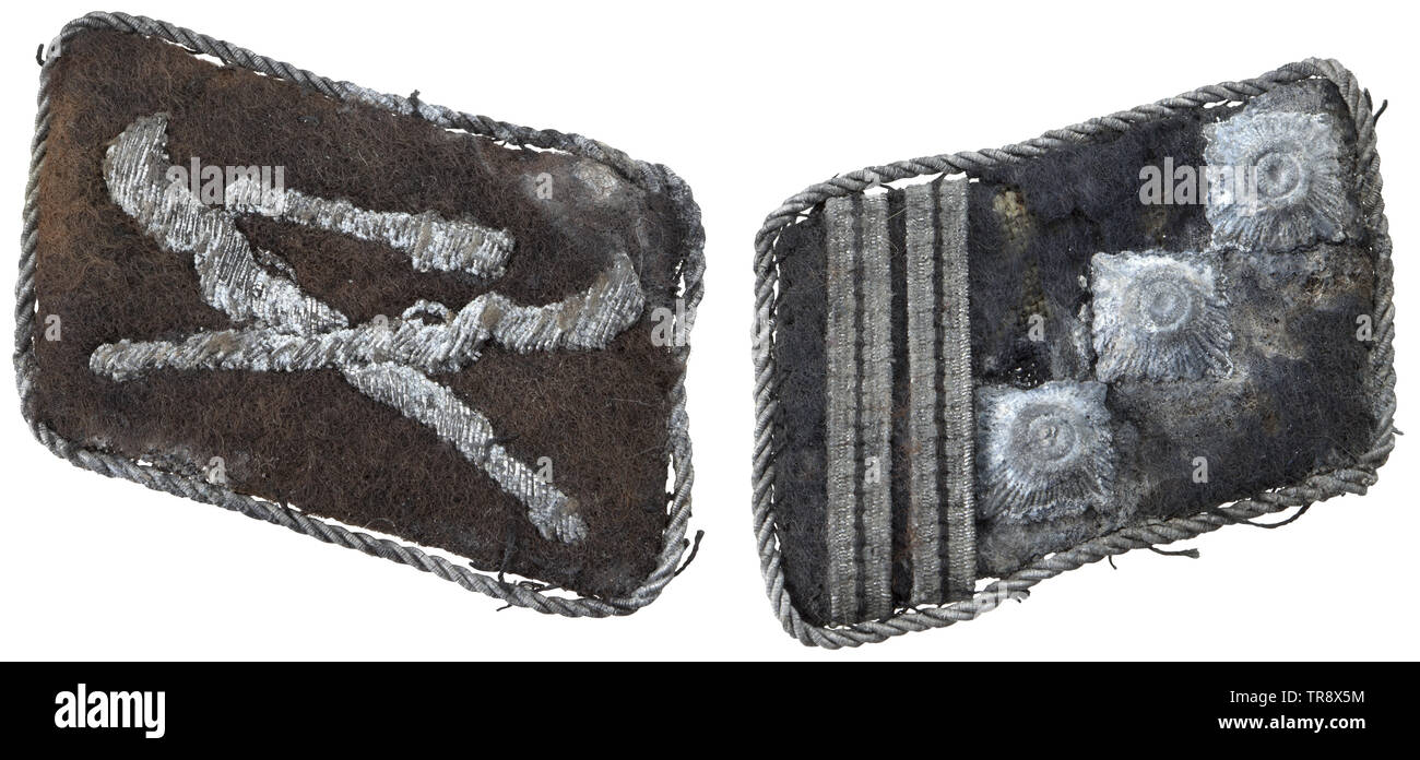 A pair of collar patches for a Hauptsturmführer of the Division 'Dirlewanger' Hand-embroidered with silver tinsel thread on a black base. Extremely rare collar patches, but in a poor state of condition. historic, historical, 20th century, 1930s, 1940s, Waffen-SS, armed division of the SS, armed service, armed services, NS, National Socialism, Nazism, Third Reich, German Reich, Germany, military, militaria, utensil, piece of equipment, utensils, object, objects, stills, clipping, clippings, cut out, cut-out, cut-outs, fascism, fascistic, National Socialist, Nazi, Nazi period, Editorial-Use-Only Stock Photo