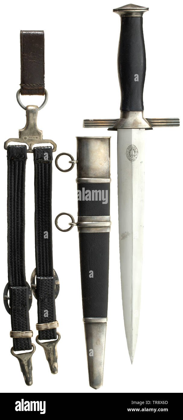 A dagger M 38 (2nd model) for leaders of the RLB with leather hanger, maker Paul Weyersberg & Co, Solingen The blade with etched maker's mark. Silver-plated pommel and cross-guard. Black leather-covered grip with partially enamelled emblem (small chip). Black leathered steel scabbard with silver-plated fittings. Black leather suspension hanger (leather replaced?) with silvered fittings and RZM marked clip 'M5/10'. Length 37.5 cm. Very beautiful condition. historic, historical, Reichsluftschutzbund, State Air Protection Corps, organisation, organization, organizations, organ, Editorial-Use-Only Stock Photo