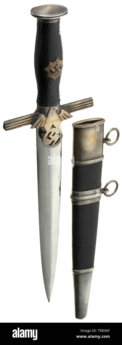 A dagger M 38 (2nd model) for leaders of the RLB with leather hanger, maker Paul Weyersberg & Co, Solingen The blade with etched maker's mark. Silver-plated pommel and cross-guard. Black leather-covered grip with partially enamelled emblem (small chip). Black leathered steel scabbard with silver-plated fittings. Black leather suspension hanger (leather replaced?) with silvered fittings and RZM marked clip 'M5/10'. Length 37.5 cm. Very beautiful condition. historic, historical, Reichsluftschutzbund, State Air Protection Corps, organisation, organization, organizations, organ, Editorial-Use-Only Stock Photo