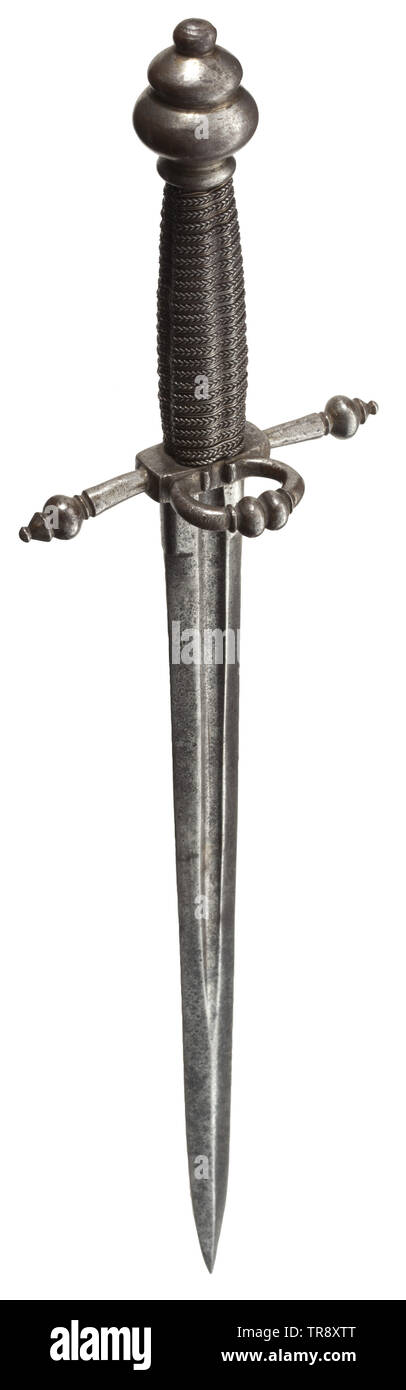 A German left-hand dagger, circa 1600 Double-edged blade with fullers on both sides, ridged point and short ricasso. Cross-guard set off by balusters with thumb ring and offset round pommel. Replaced iron wire grip. Length 34 cm. historic, historical, dagger, daggers, thrusting, thrustings, baton, weapon, arms, weapons, arms, fighting device, object, objects, stills, clipping, cut out, cut-out, cut-outs, 17th century, Additional-Rights-Clearance-Info-Not-Available Stock Photo