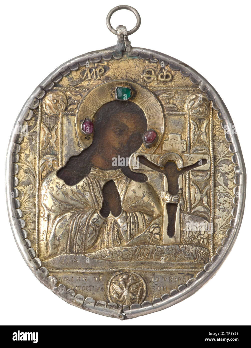 An important Russian gilt panagia, 1st third of the 18th century Hand painted, gilt silver, engraved, chased, studded with precious stones (ruby cabochons) and glass. The obverse portraying Mary and Christ, at bottom the Russian double eagle with Cyrillic inscription. The reverse with the depiction of Archangel Michael, St. Nicholas, and Archangel Gabriel. Painting minimally restored. In a case of later date. historic, historical, Additional-Rights-Clearance-Info-Not-Available Stock Photo