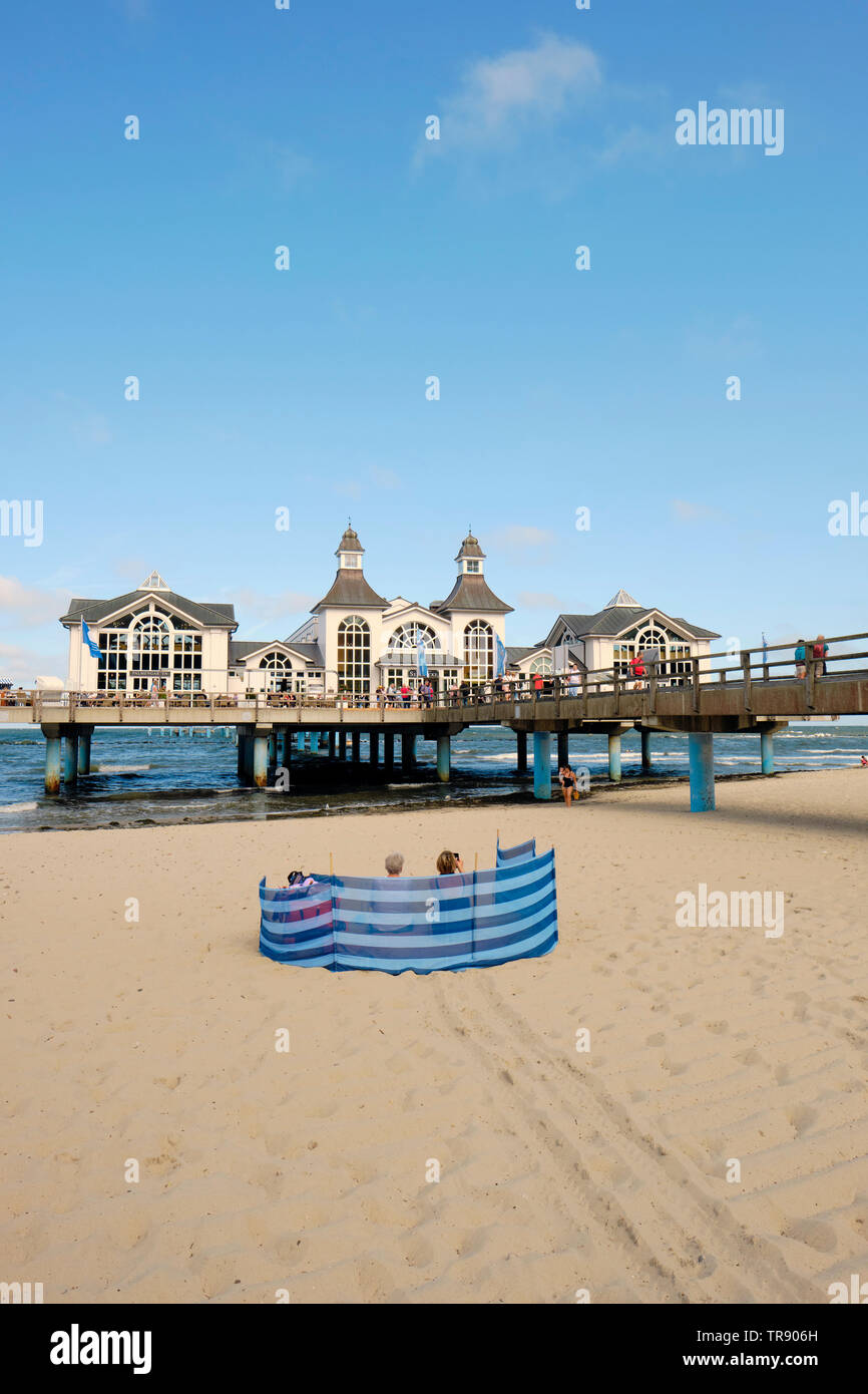 Sellin Pier and beach a Baltic Sea resort town on the German island of Rügen, known for its beaches and Seebrücke (pier), with a 1920s-style pavilion. Stock Photo