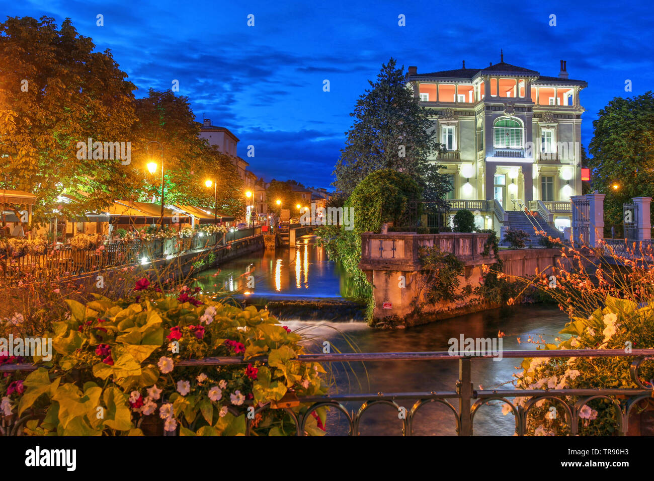 Night scene in the small and charming village of L'Isle-sur-la-Sorgue nearby Avignon in France. Stock Photo