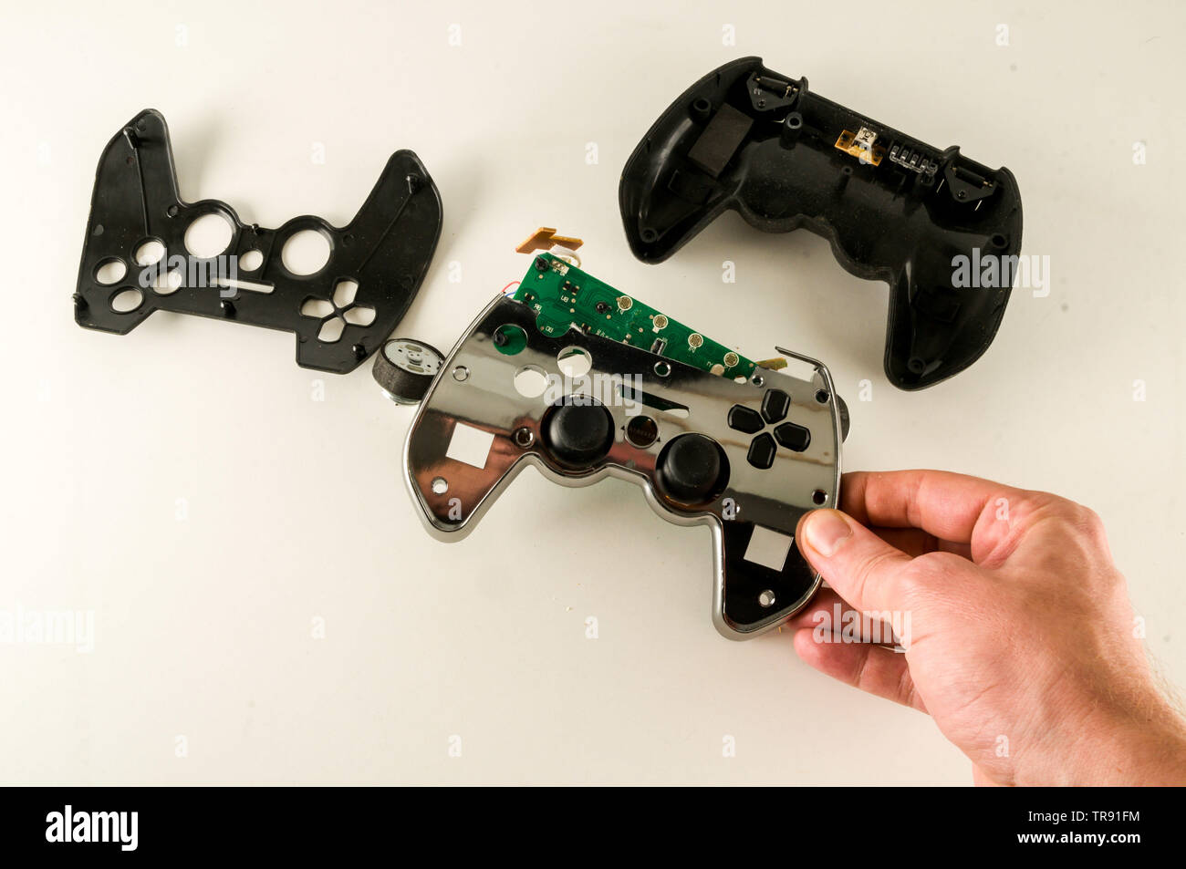 Photo of Broken Gamepad Joystick on white backrgound Stock Photo Alamy