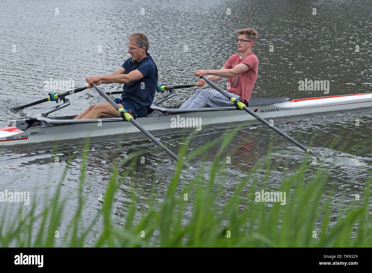 father and son rowing double scull, rowing club Wilhelmsburg, Hamburg, Germany Stock Photo