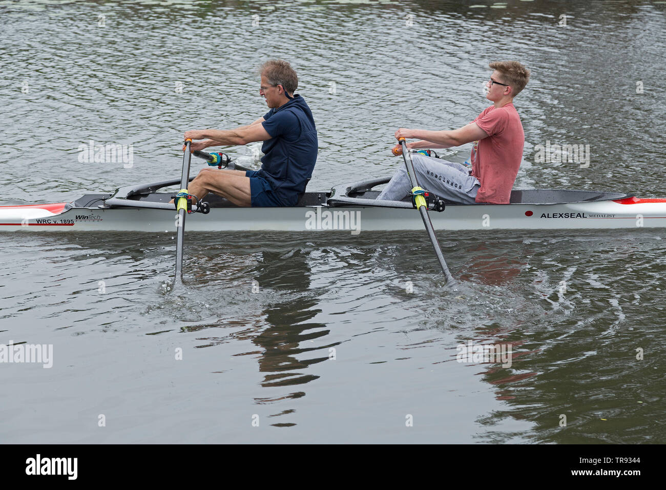 father and son rowing double scull, rowing club Wilhelmsburg, Hamburg, Germany Stock Photo
