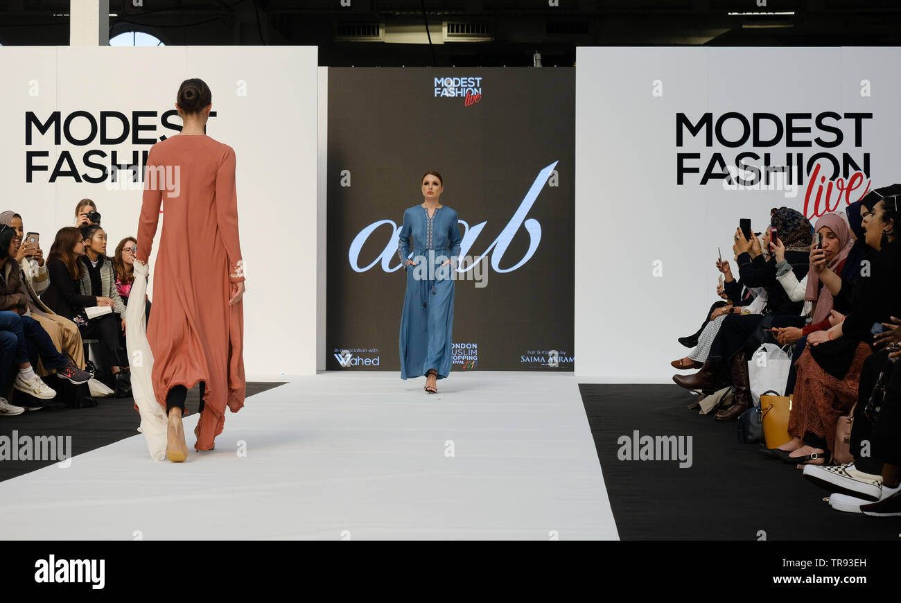 Aab designs shown at the Modest Fashion Show at the Muslim Shopping Festival held in Olympia Exhibition Hall, London. Stock Photo