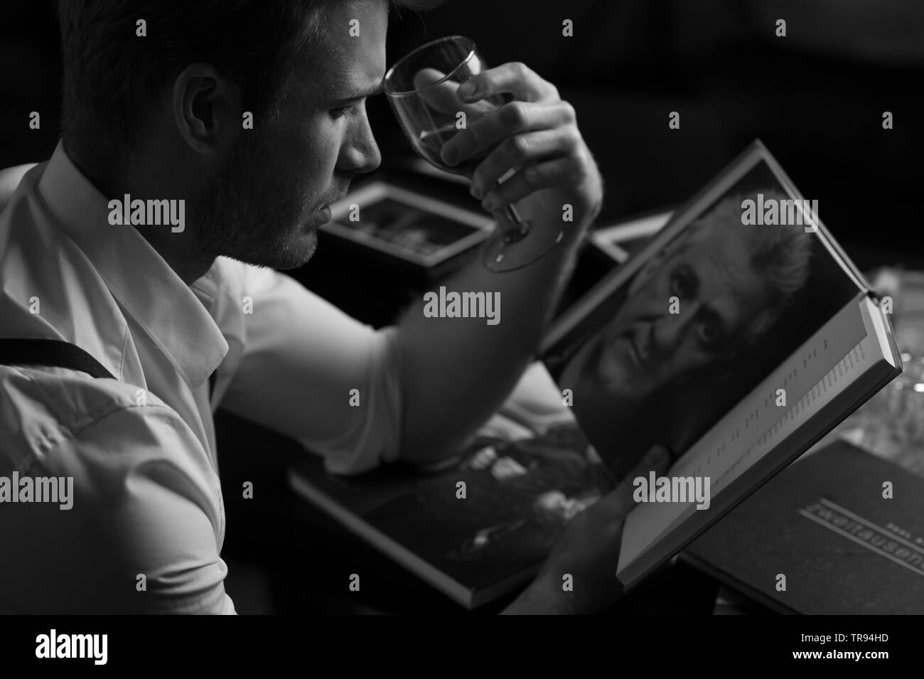 men with wine and a book Stock Photo - Alamy
