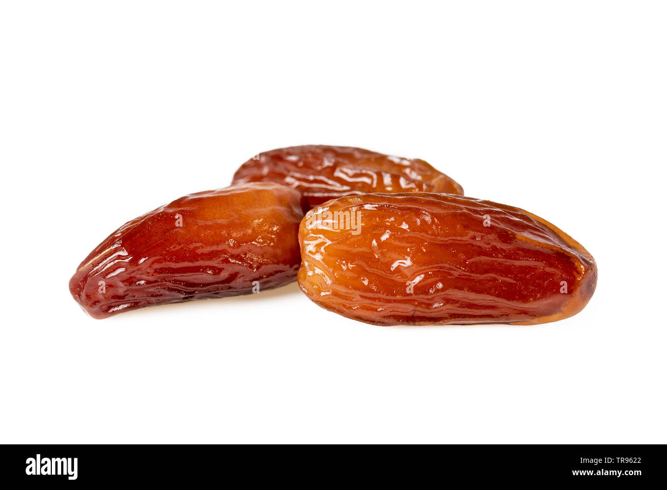 Sweet dates fruit or three dried dates isolated on white background Stock Photo Alamy