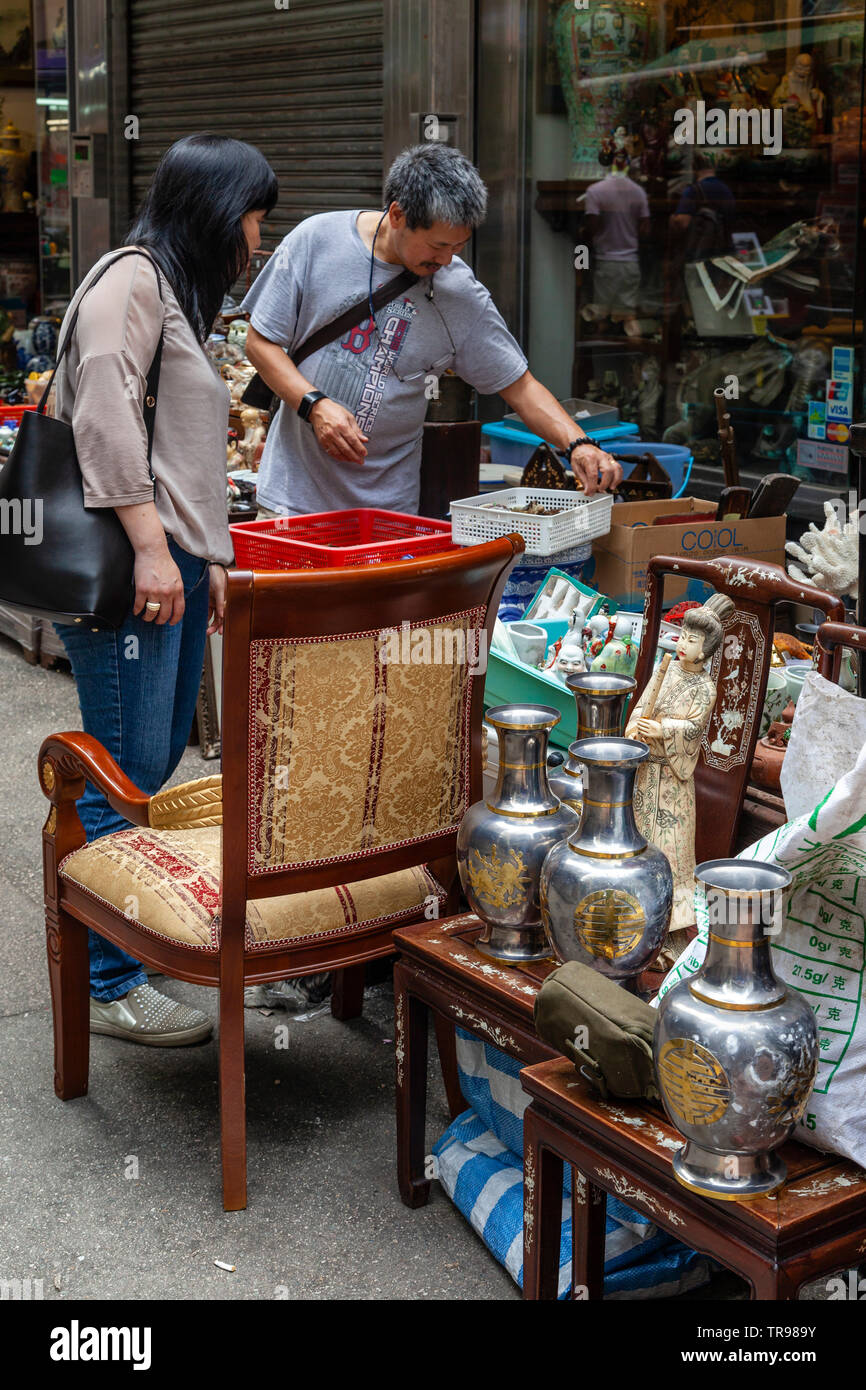 Chinese People Shopping At A Bric-a-Brac Market, Tung Street, Hong Kong, China Stock Photo