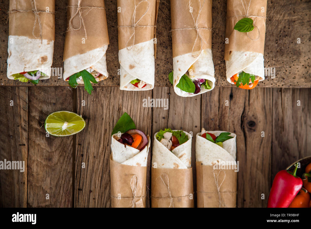 Tortilla wraps with vegetables. Mexican tortillas. Tacos with nachos