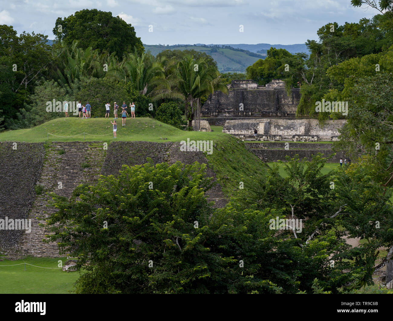 Tourists at Ancient Mayan Archaeological Site, San Jose Succotz, Cayo District, Belize Stock Photo