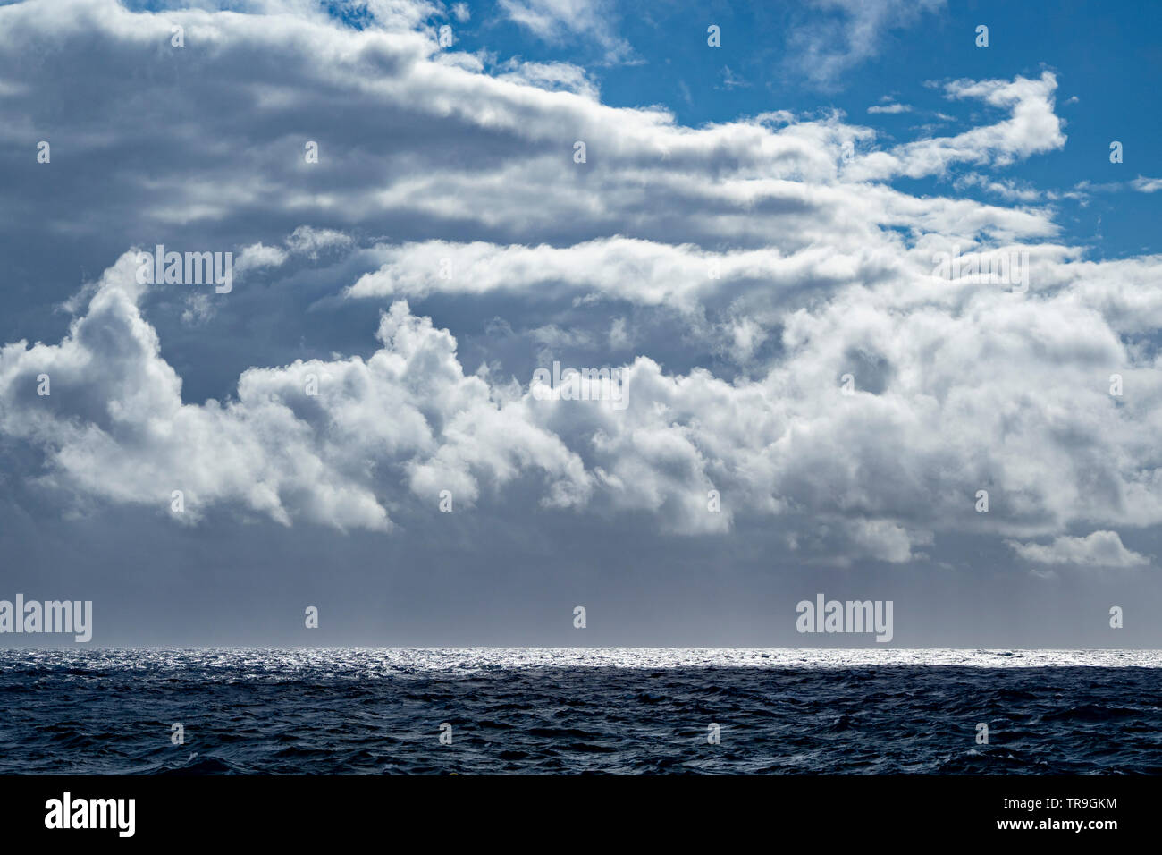 Clouds over Sea, Cala Blanca, Menorca, Spain Stock Photo