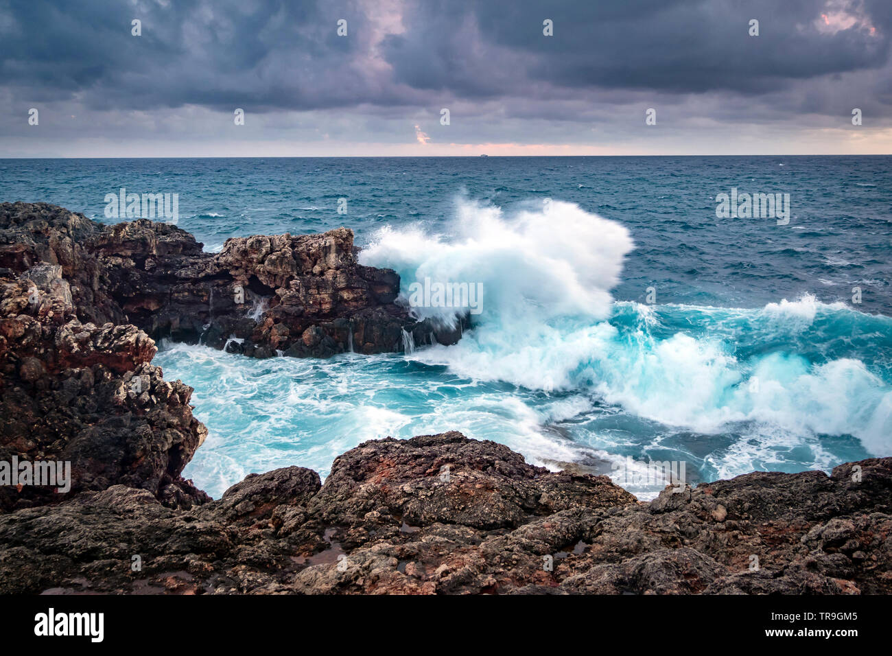 Rough Sea, Cala Blanca, near Cuitadella, Menorca, Spain Stock Photo