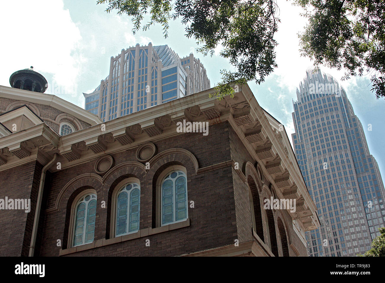 Old and new architecture in Charlotte, NC, USA. The McGlohon Theatre in ...