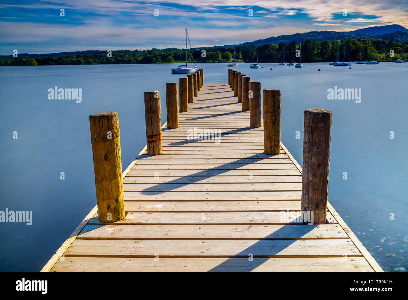 long exposure of a jetty creating a smooth water effect Stock Photo