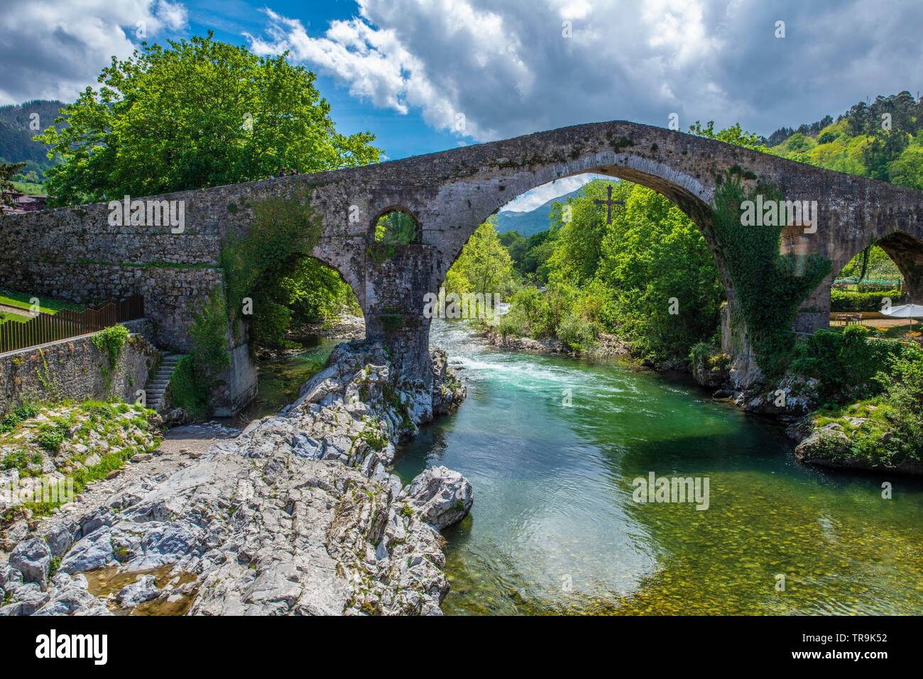 The stone bridge of Cangas de Onis in Asturia Spain dating back to the 14. century is the main tourist attraction Stock Photo