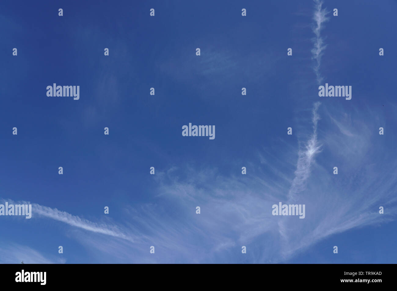 Blue sky with white clouds, UK Stock Photo