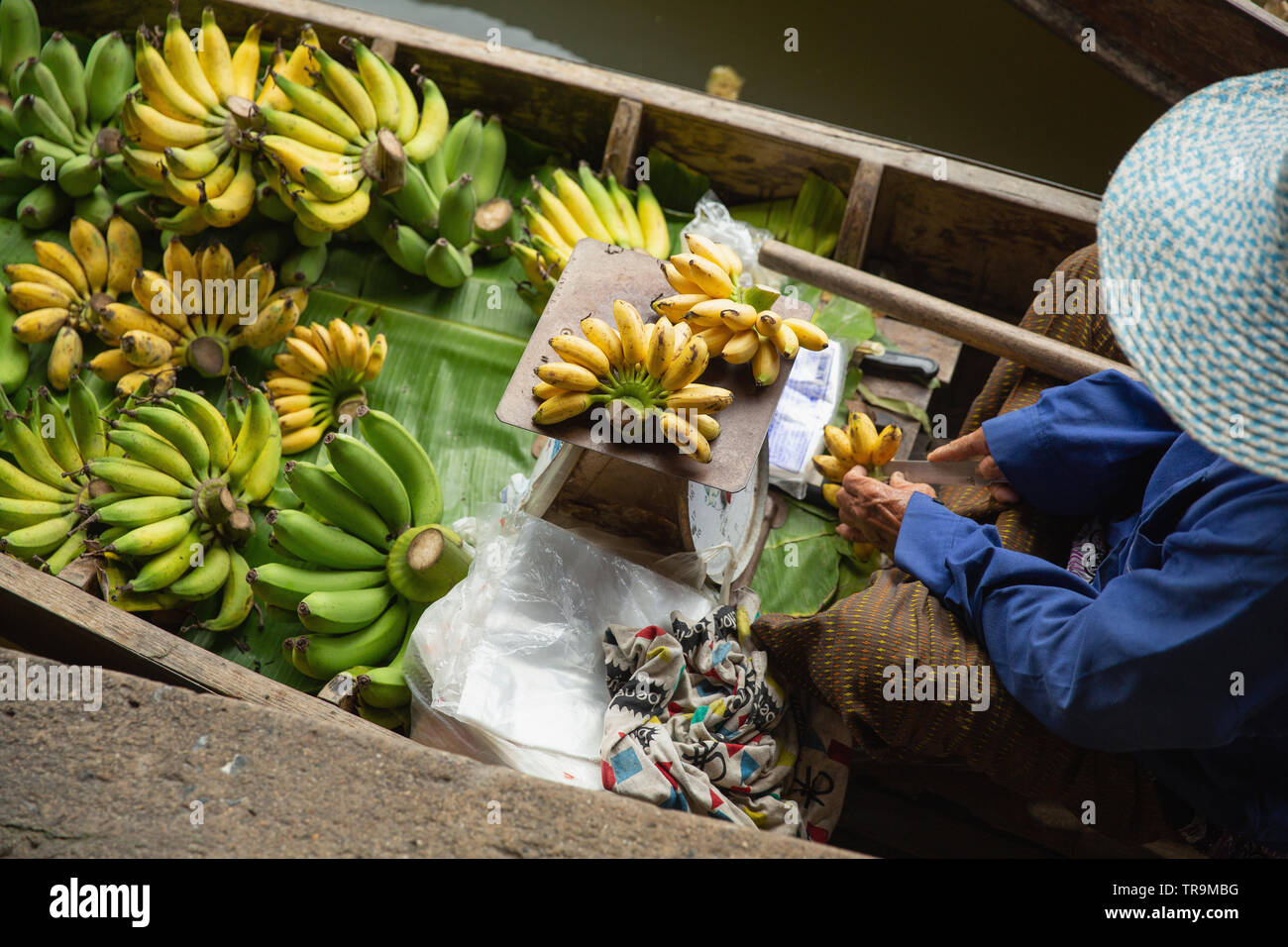 Banana Vendor at Damnoen Saduak Floating Market, Damnoen Saduak District, Ratchaburi Province, near Bangkok, Thailand, Asia Stock Photo