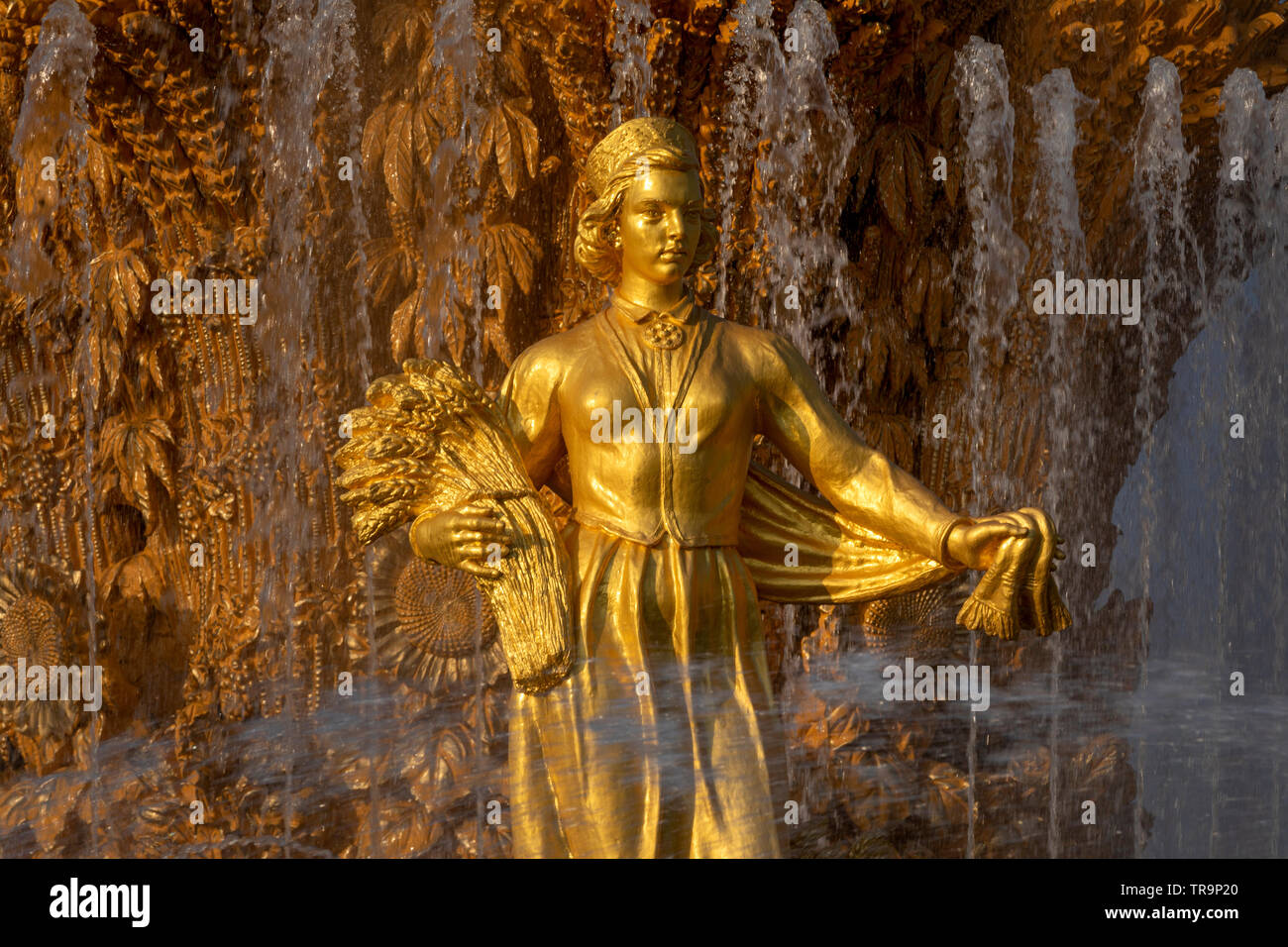Close-up of the statue of the Latvian SSR on the fountain 'Friendship of peoples' on the Main alley at the exhibition complex VDNH in Moscow, Russia Stock Photo