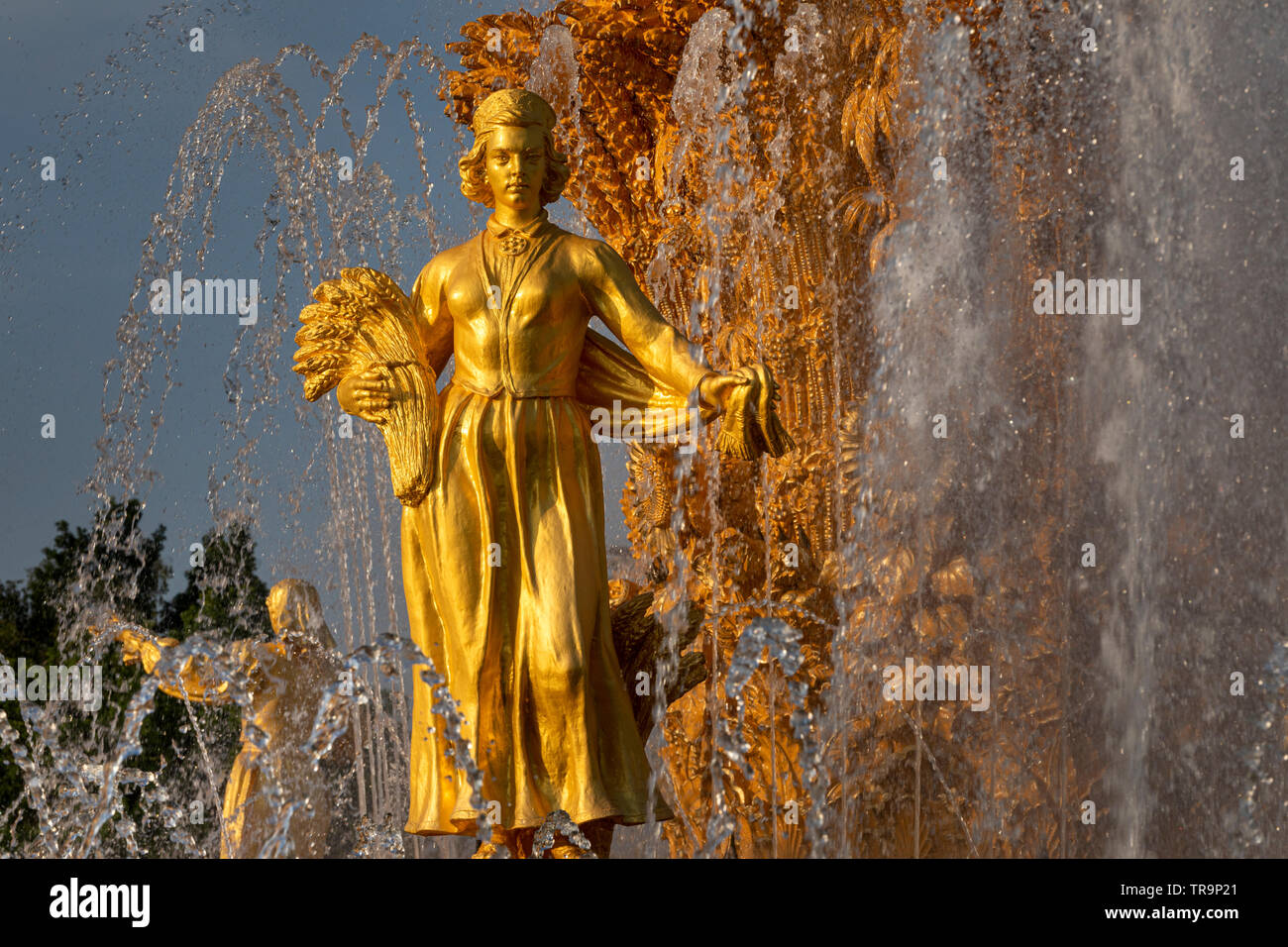 Close-up of the statue of the Latvian SSR on the fountain 'Friendship of peoples' on the Main alley at the exhibition complex VDNH in Moscow, Russia Stock Photo