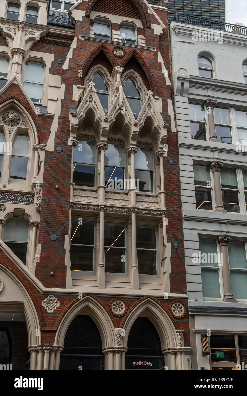 Fabulous example of the front of an old building in Eastcheap in the City of London revealing the former architectural glory of this area of London Stock Photo