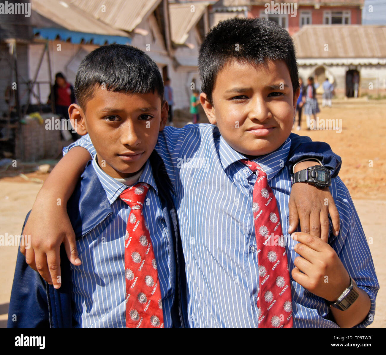 Two young boys in school uniform at Samata Bamboo School, Bhaktapur, Kathmandu Valley, Nepal Stock Photo