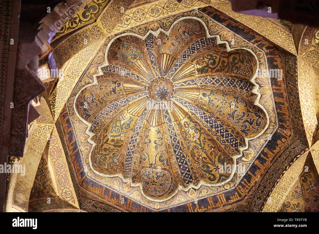 Domed gold and tile ceiling in the Mezquita cathedral mosque in Cordoba, Spain. Stock Photo