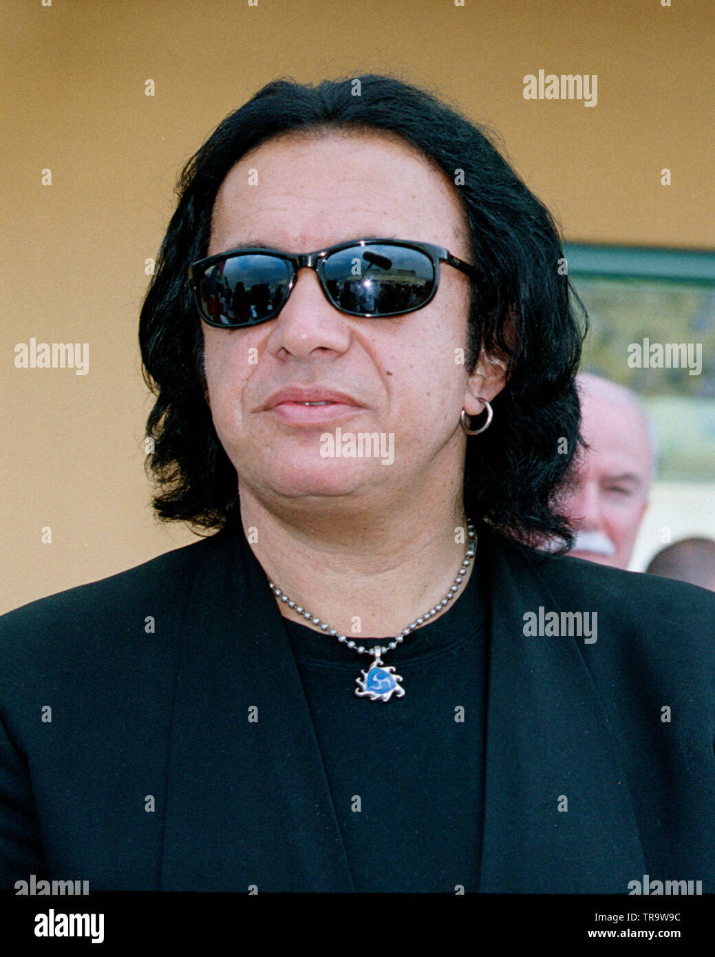 Gene Simmons fron the legendary rock band KISS attends a NASCAR race at Homestead Miami Speedway in November 1997. Stock Photo