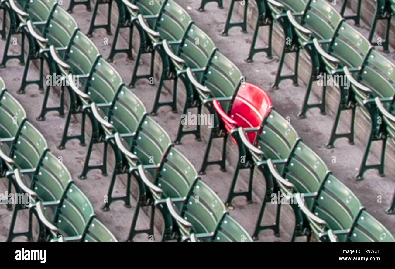 Red seat in a sea of green. Red Sox playerTed Williams' longest ever homerun at Fenway Park, Boston Stock Photo