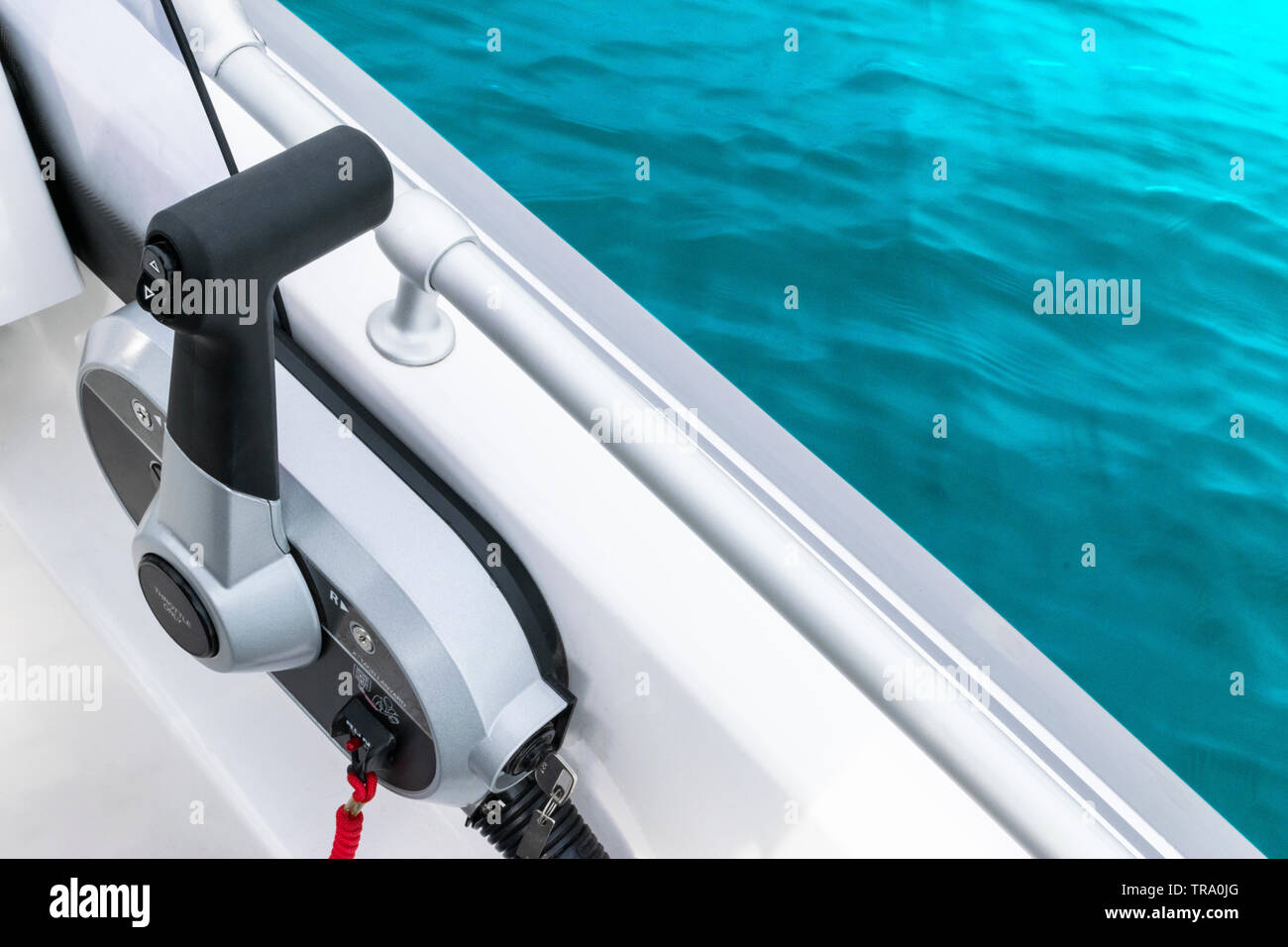 Close up throttle lever on motor boat or central gear on luxury fishing boat. Boat steering gear close up Stock Photo